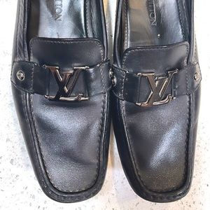 Iconic Louis Vuitton shoes made with calf leather with LV initials.